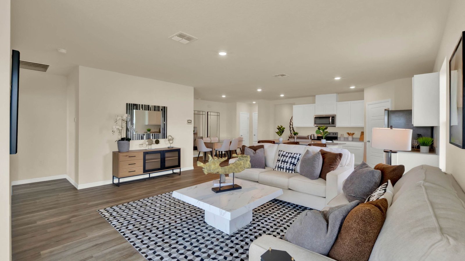 Living room with view of kitchen and dining area