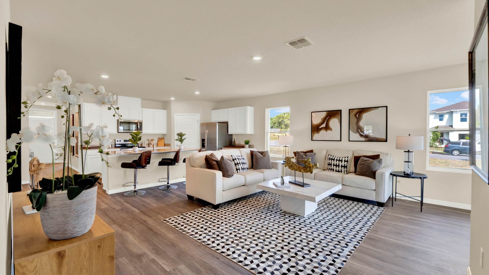 living room with large windows for natural light