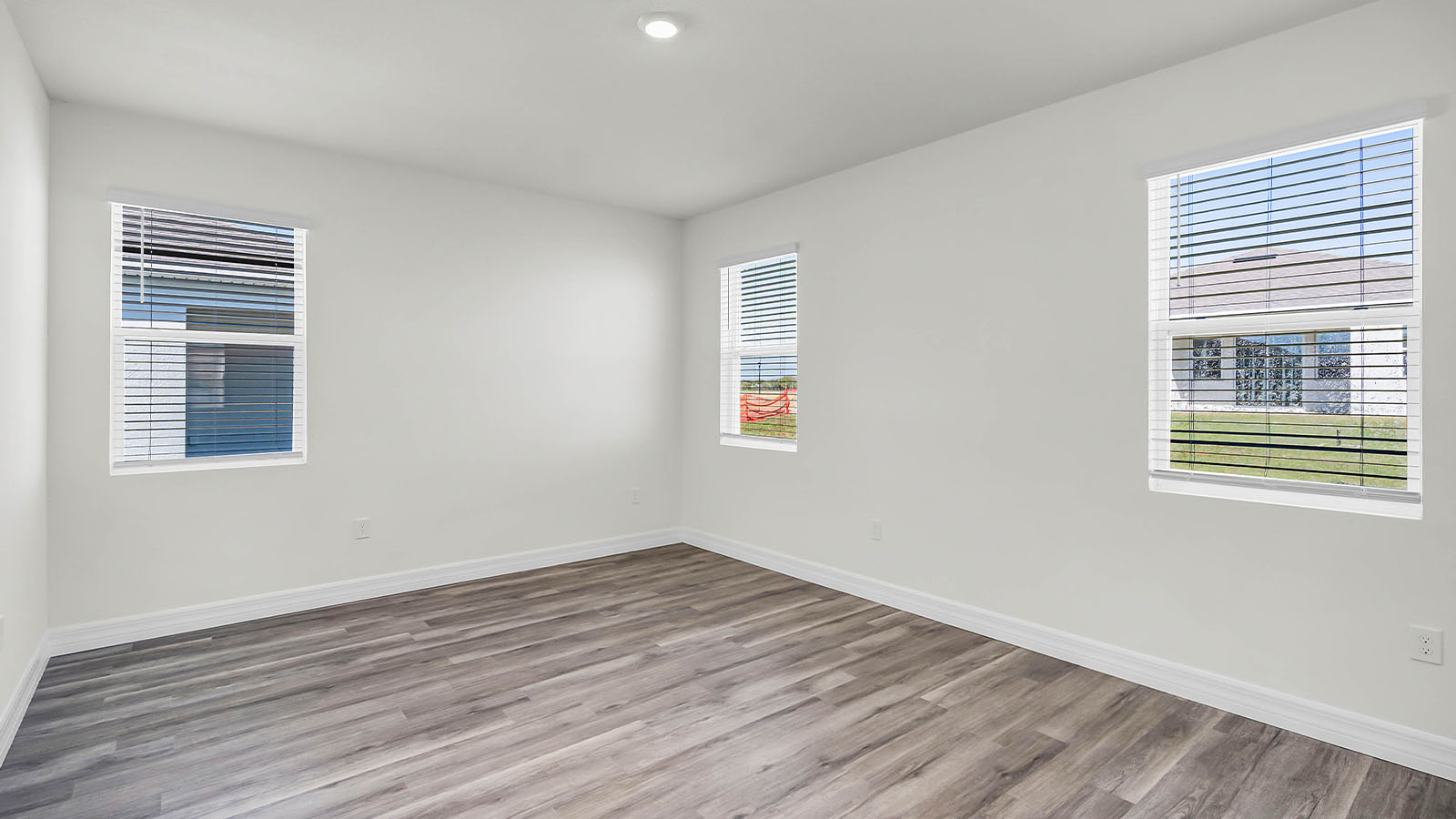 primary bedroom with windows
