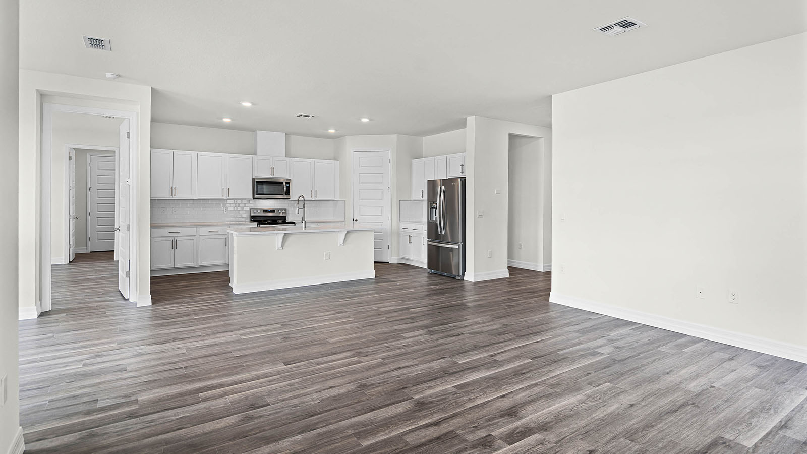 living room with view of kitchen and dining room