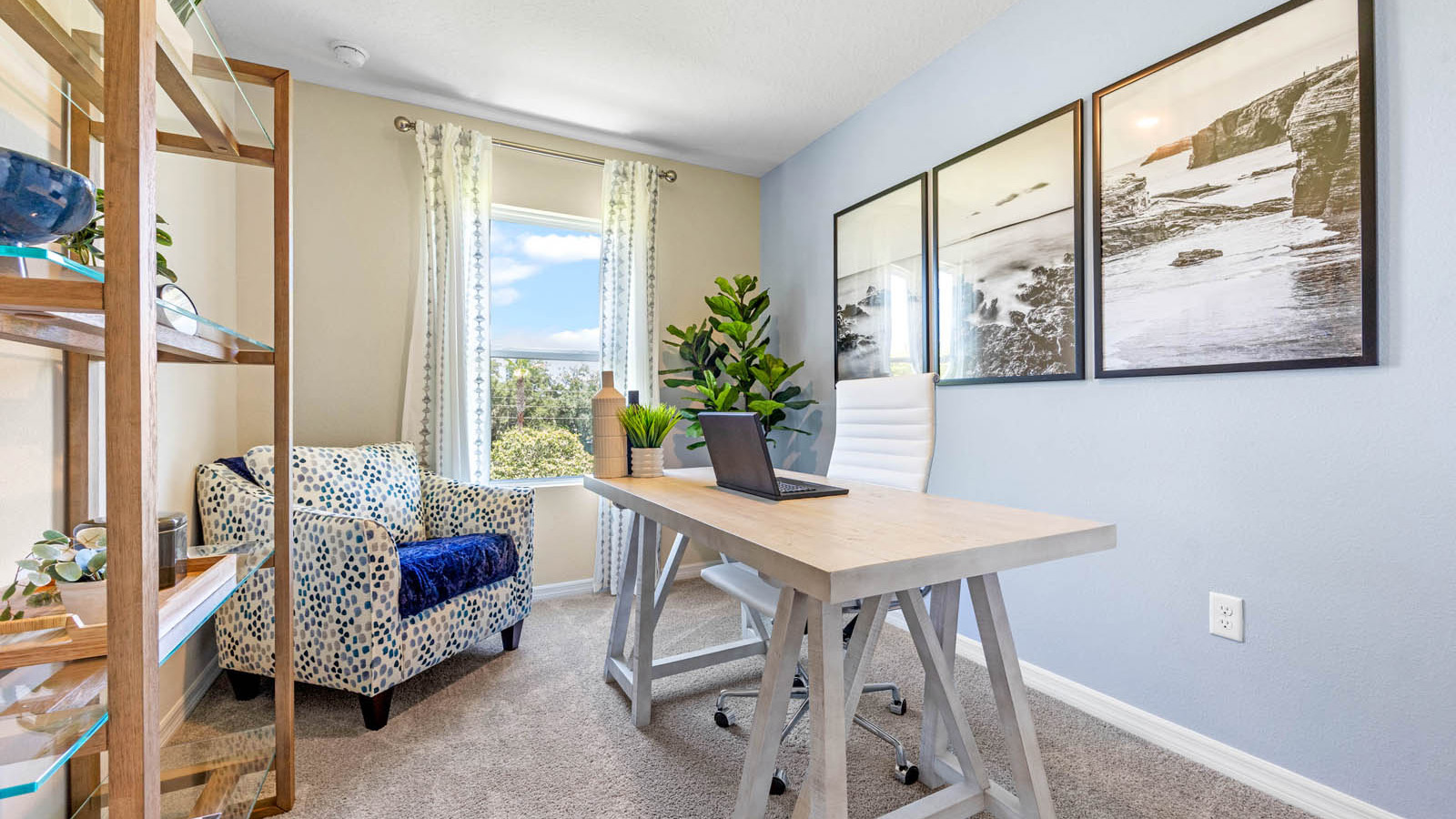 Office with desk, bookshelf and sitting area