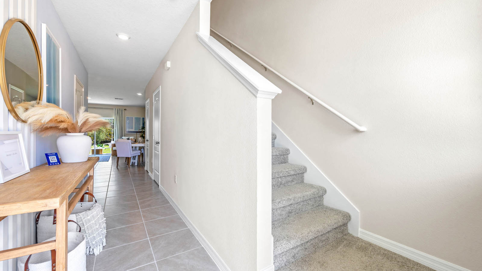 Entryway with table and view into living area