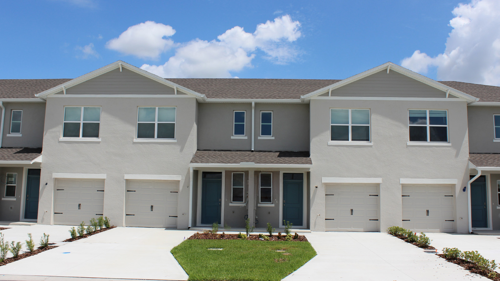 Two-story townhome with one-car garage