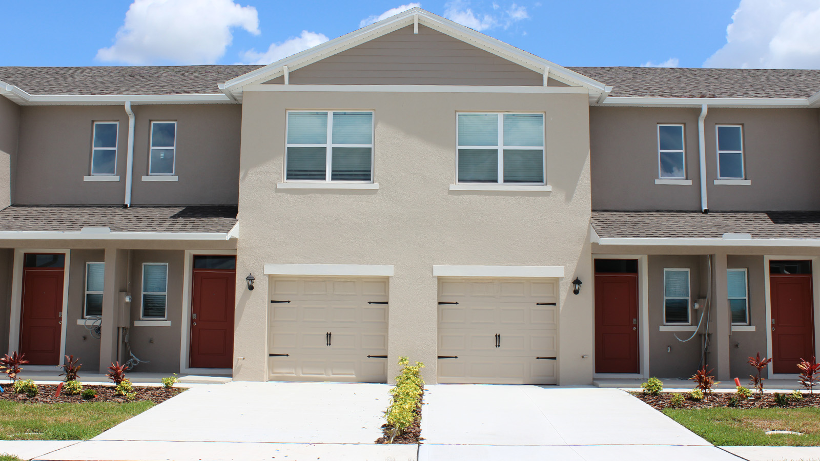 Two-story townhome with one-car garage