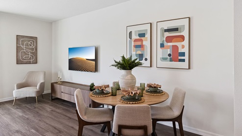 Living room with a dining nook and luxury vinyl planks throughout