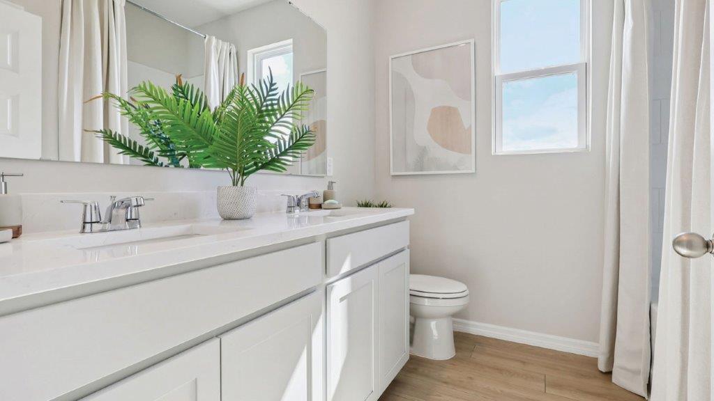 guest bathroom with dual sink