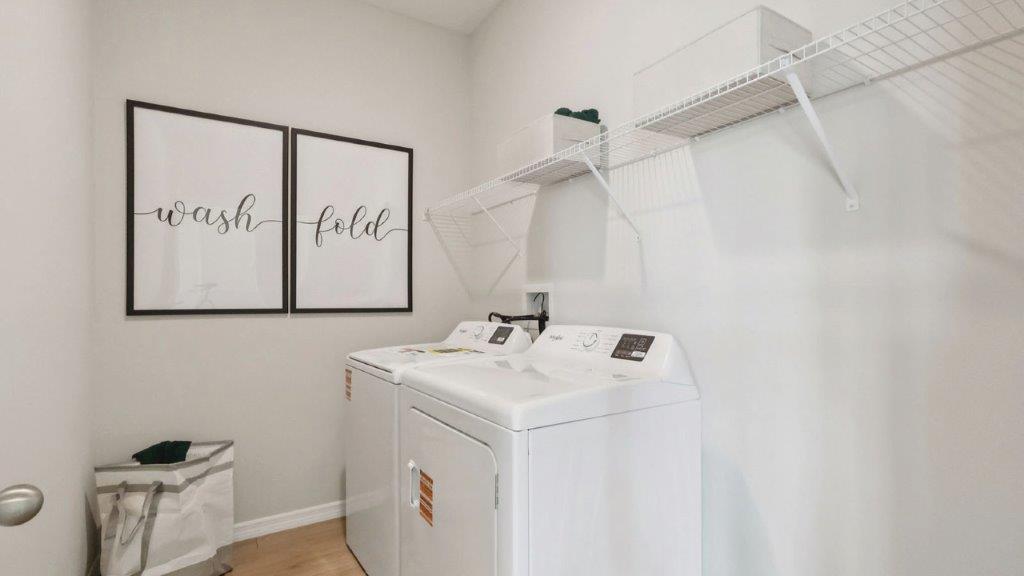 laundry room with washer and dryer