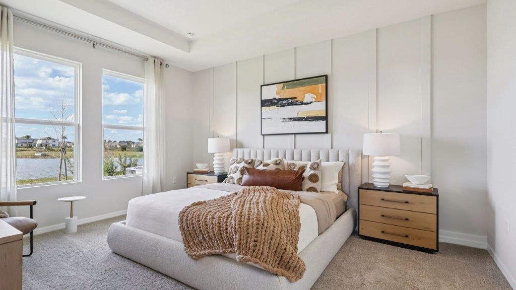 primary bedroom with windows for natural light