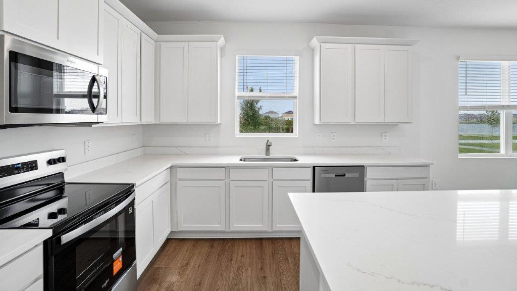 Kitchen with white cabinets