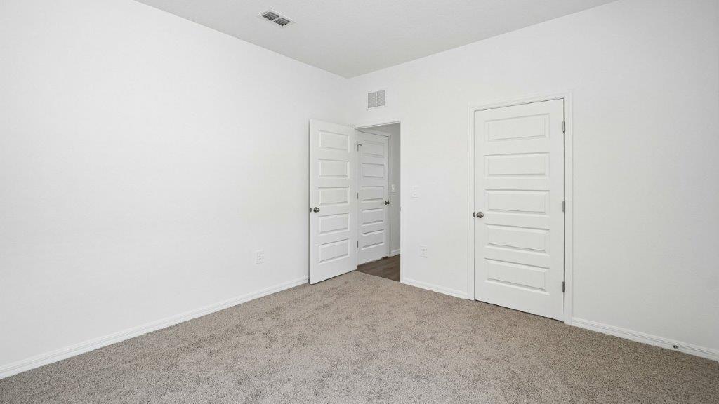 Bedroom with carpet
