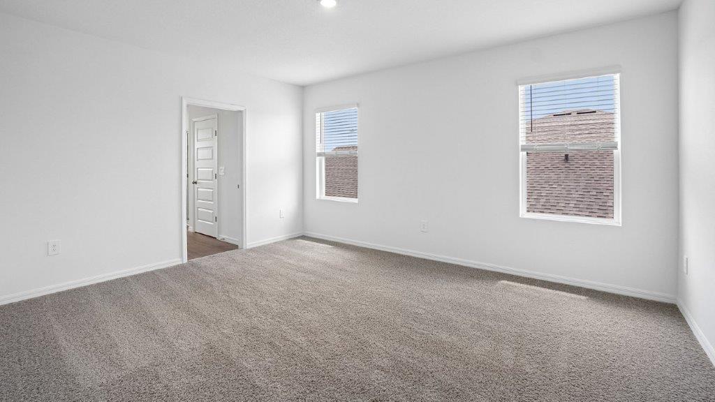 Bedroom with carpet throughout