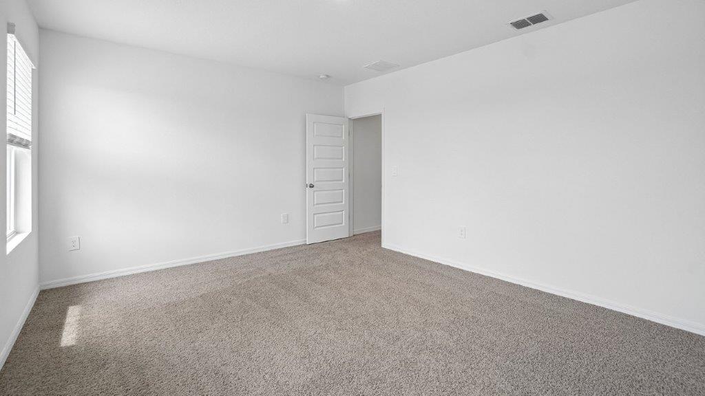 Bedroom with carpet throughout
