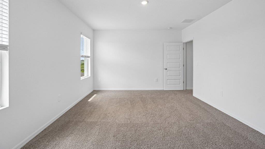 Primary bedroom with closet