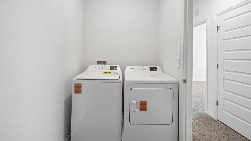 Laundry room with washer and dryer