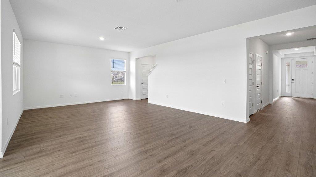 Living room with Luxury Vinyl Plank Flooring throughout
