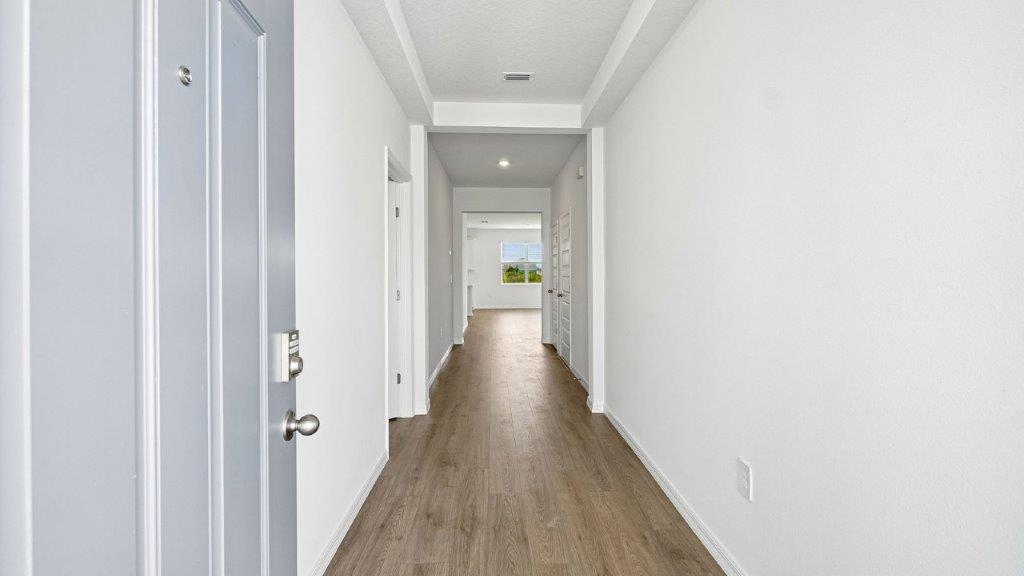 entry way of the home with luxury vinyl planks throughout
