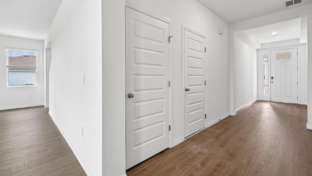 Hallway with two storage closets