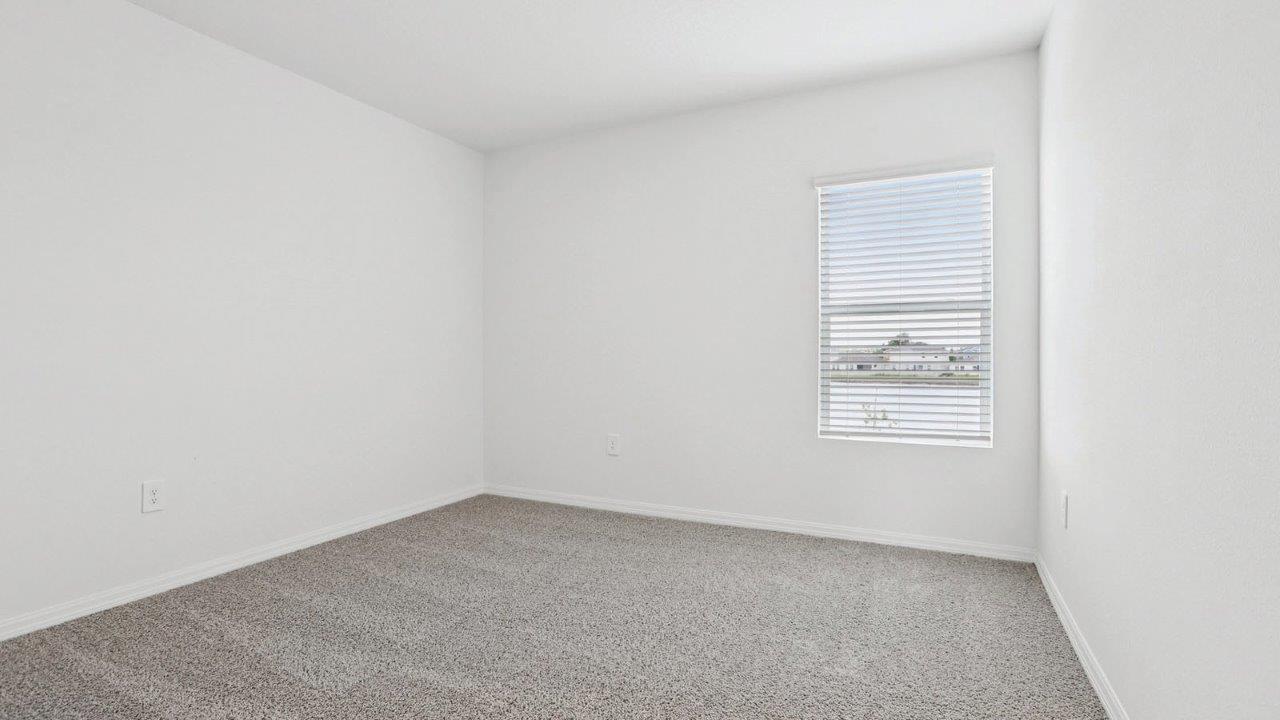guest bedroom with carpet