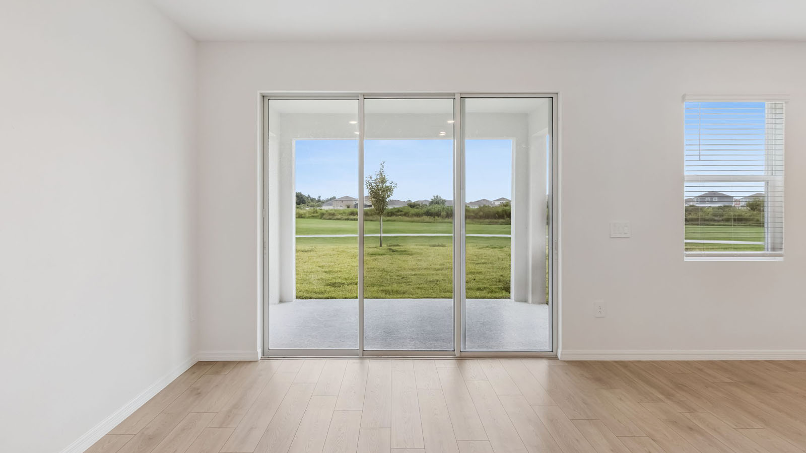 Dining room with sliding door to covered patio