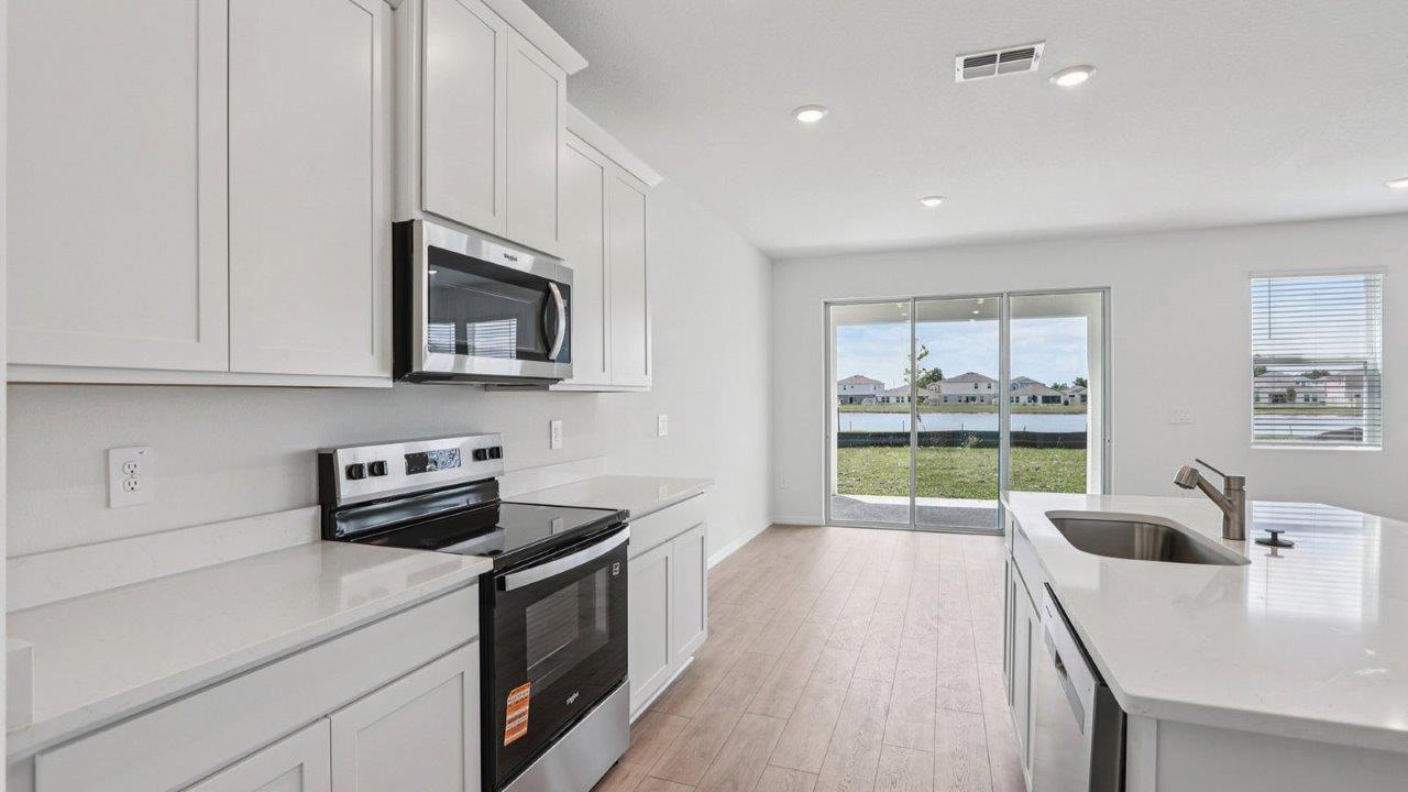 Kitchen view of the sliding glass door