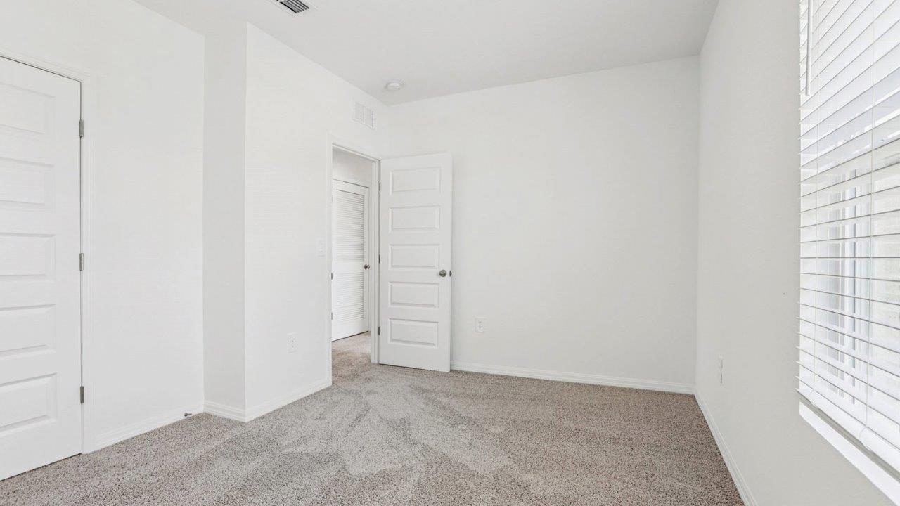 guest bedroom with built in closet