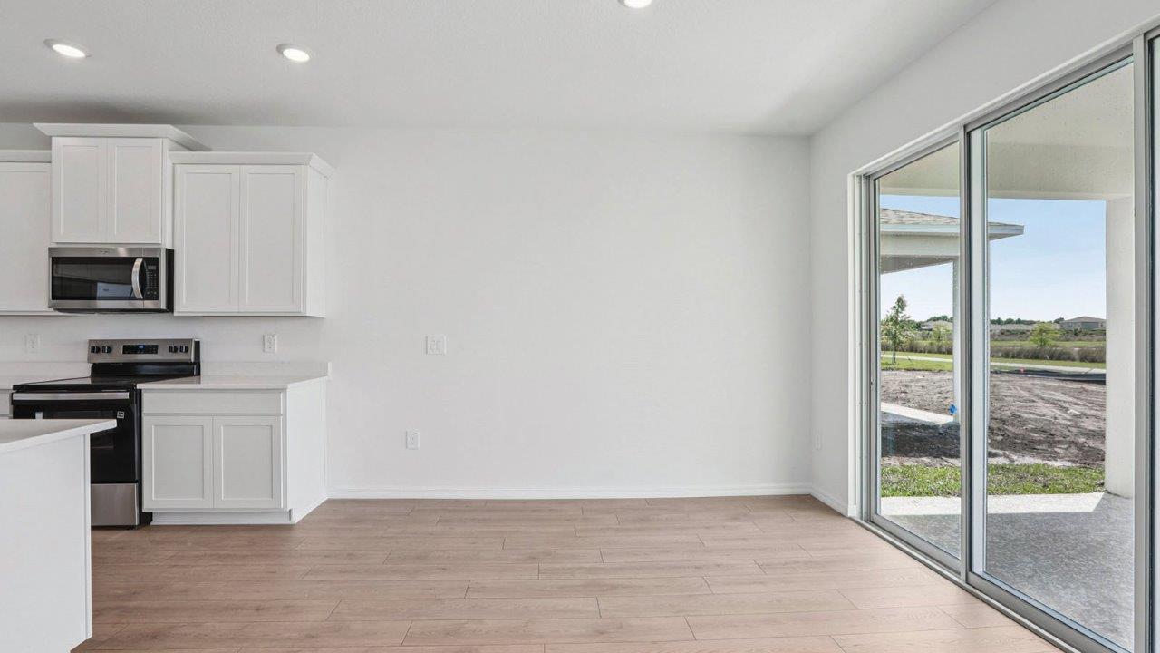 Living room with area for dining table
