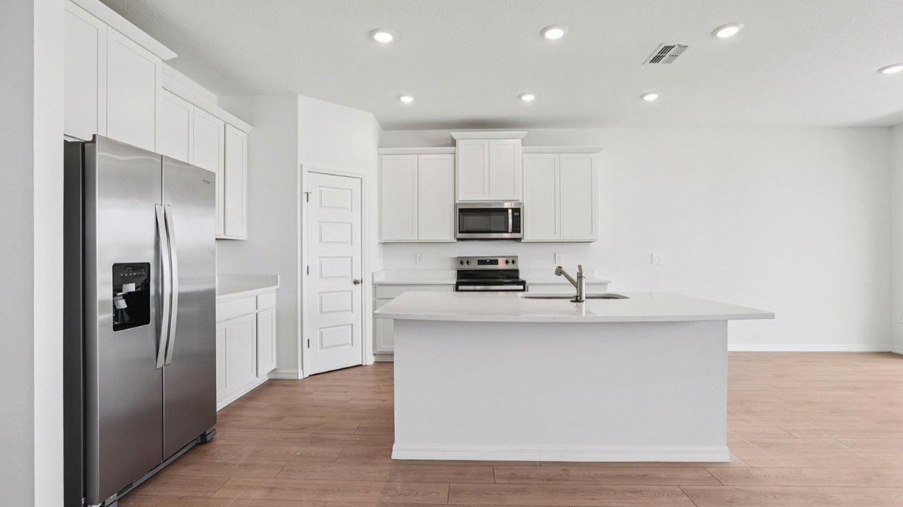 Kitchen with stainless steel appliances