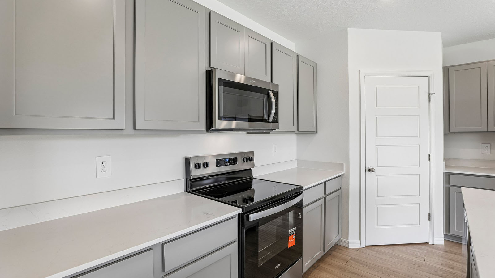 Kitchen with pantry and stainless steel appliances