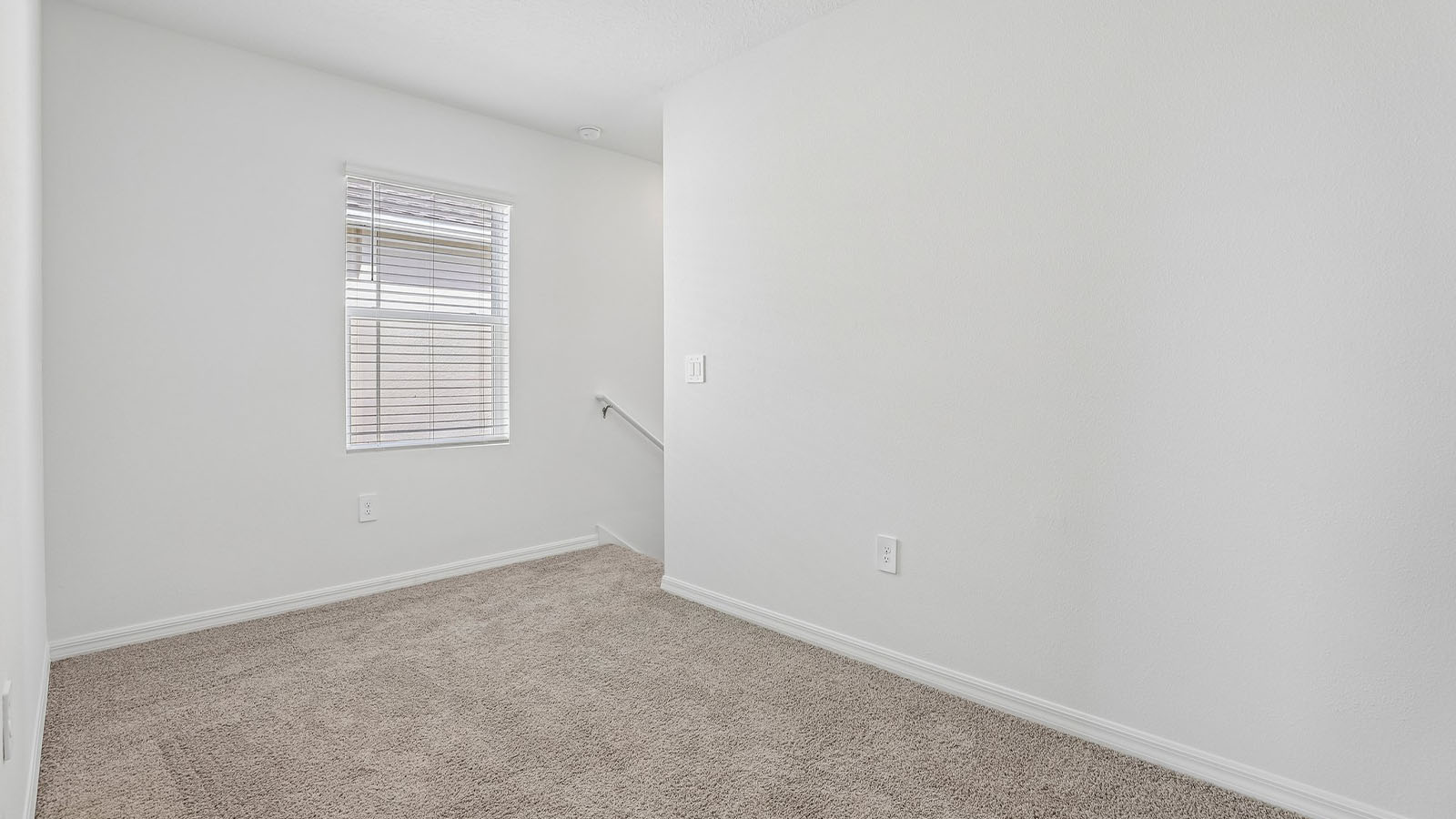 Loft area with carpet