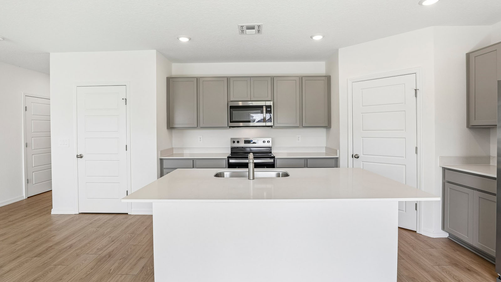 Spacious kitchen with pantry and closet