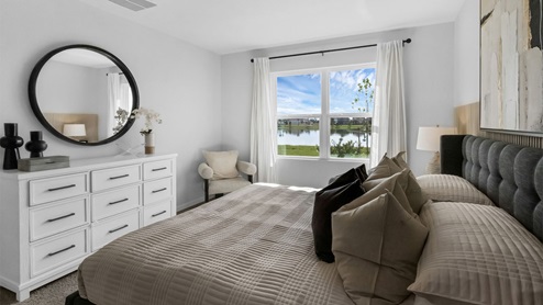Primary bedroom with carpet throughout