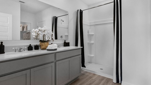 Primary bathroom with double vanity sink