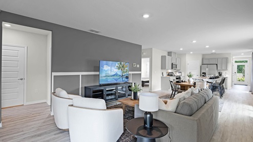 furnished living room with luxury vinyl planks