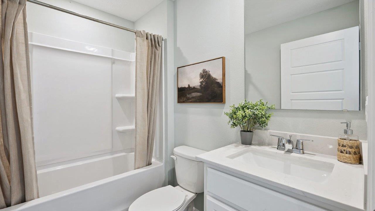 guest bathroom with tub