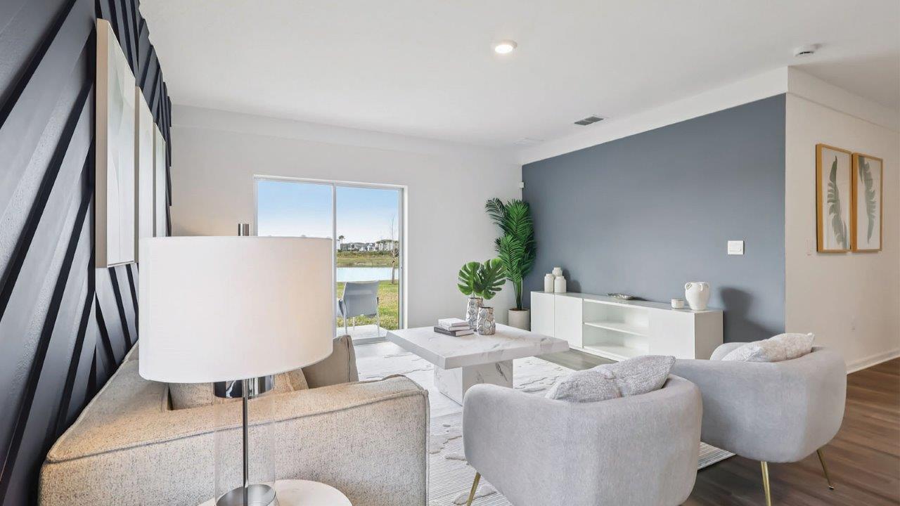 Living room with sliding doors to backyard