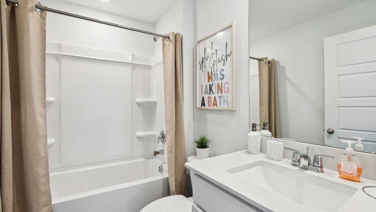 Gues bathroom with tub and single sink