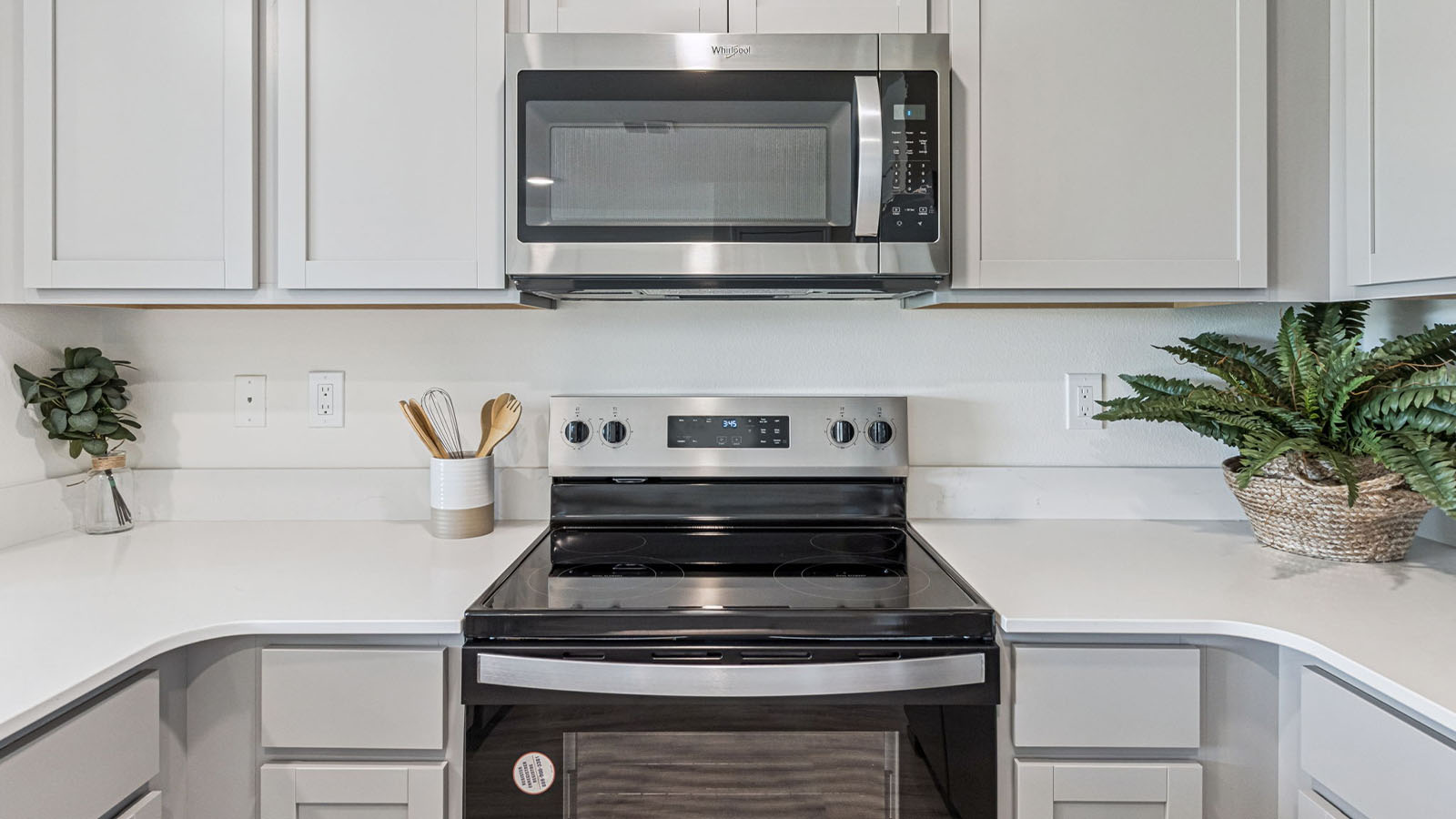 Kitchen with pantry and stainless steel appliances