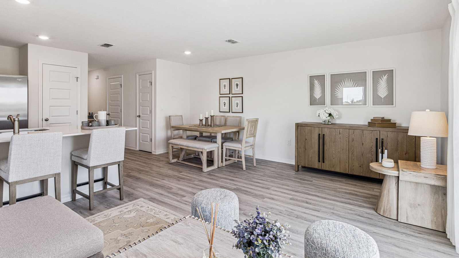 Living room with sectional couch and patio doors