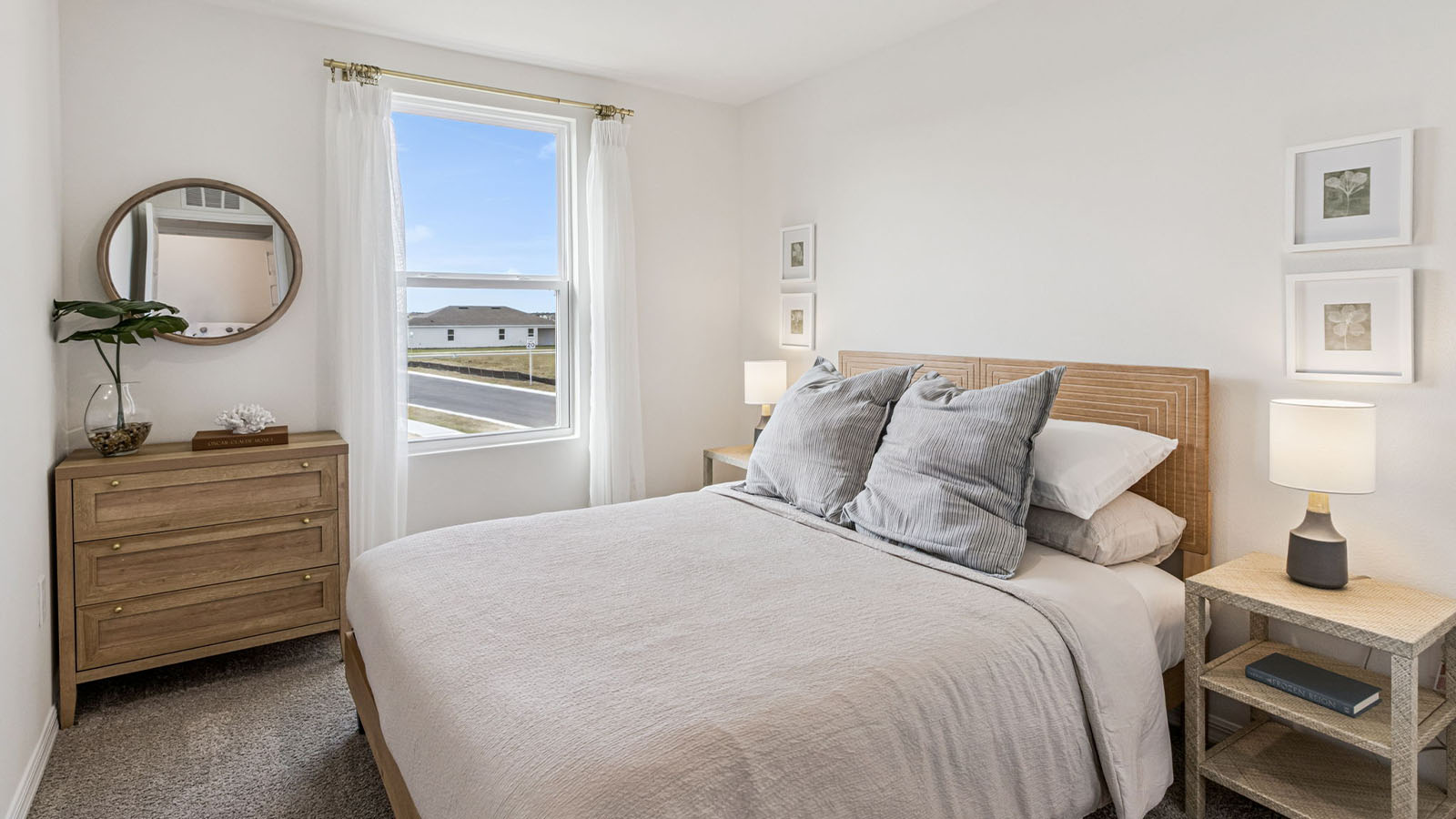 Bedroom staged as a Nursery with crib and dresser