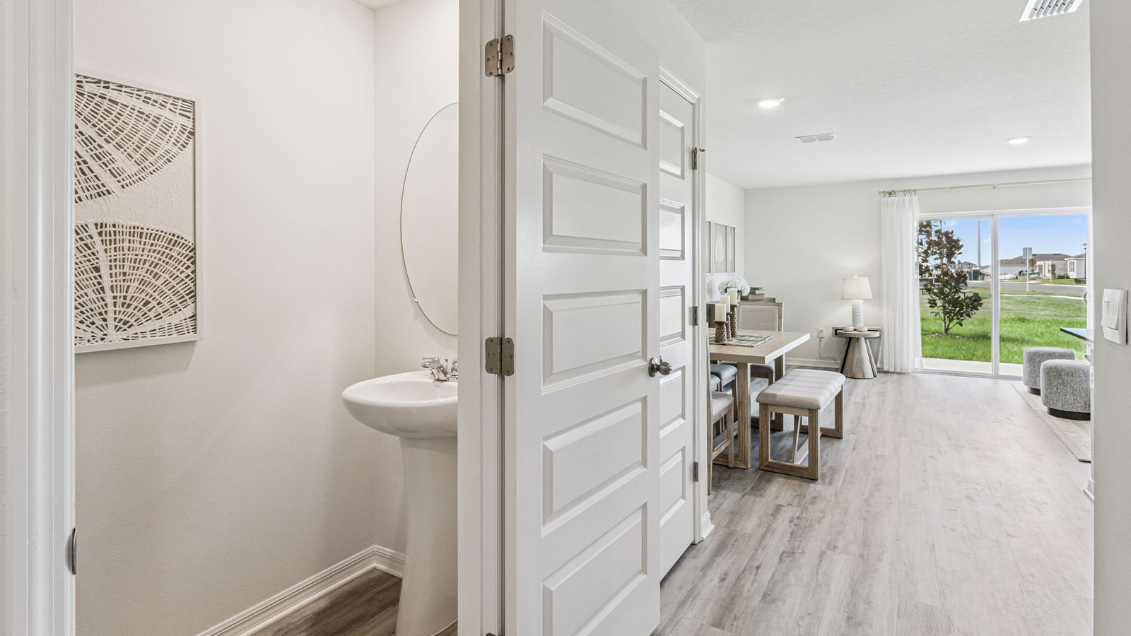 Guest bathroom with tub and single vanity sink