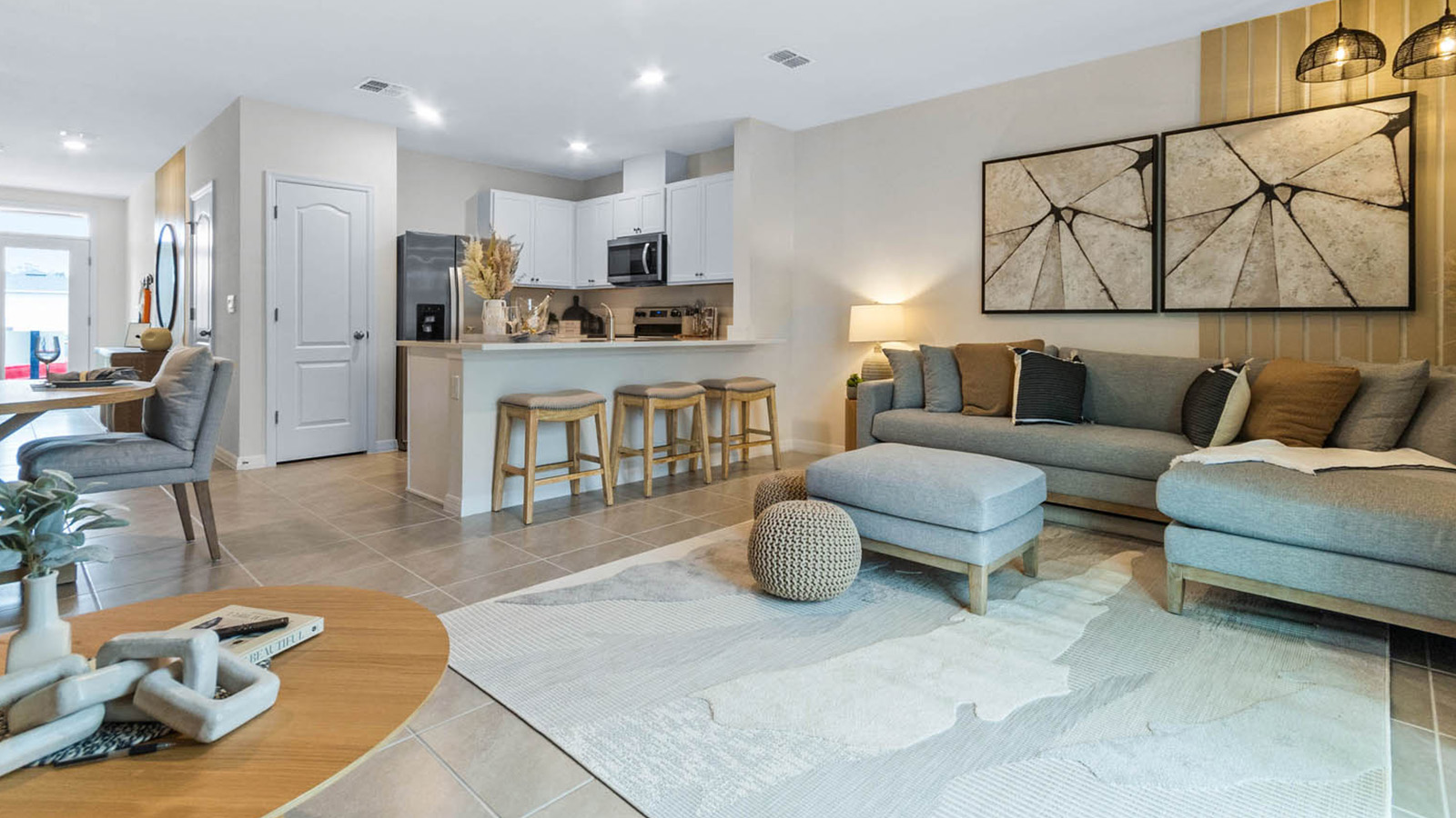 Open concept main floor living room, dining room, and kitchen