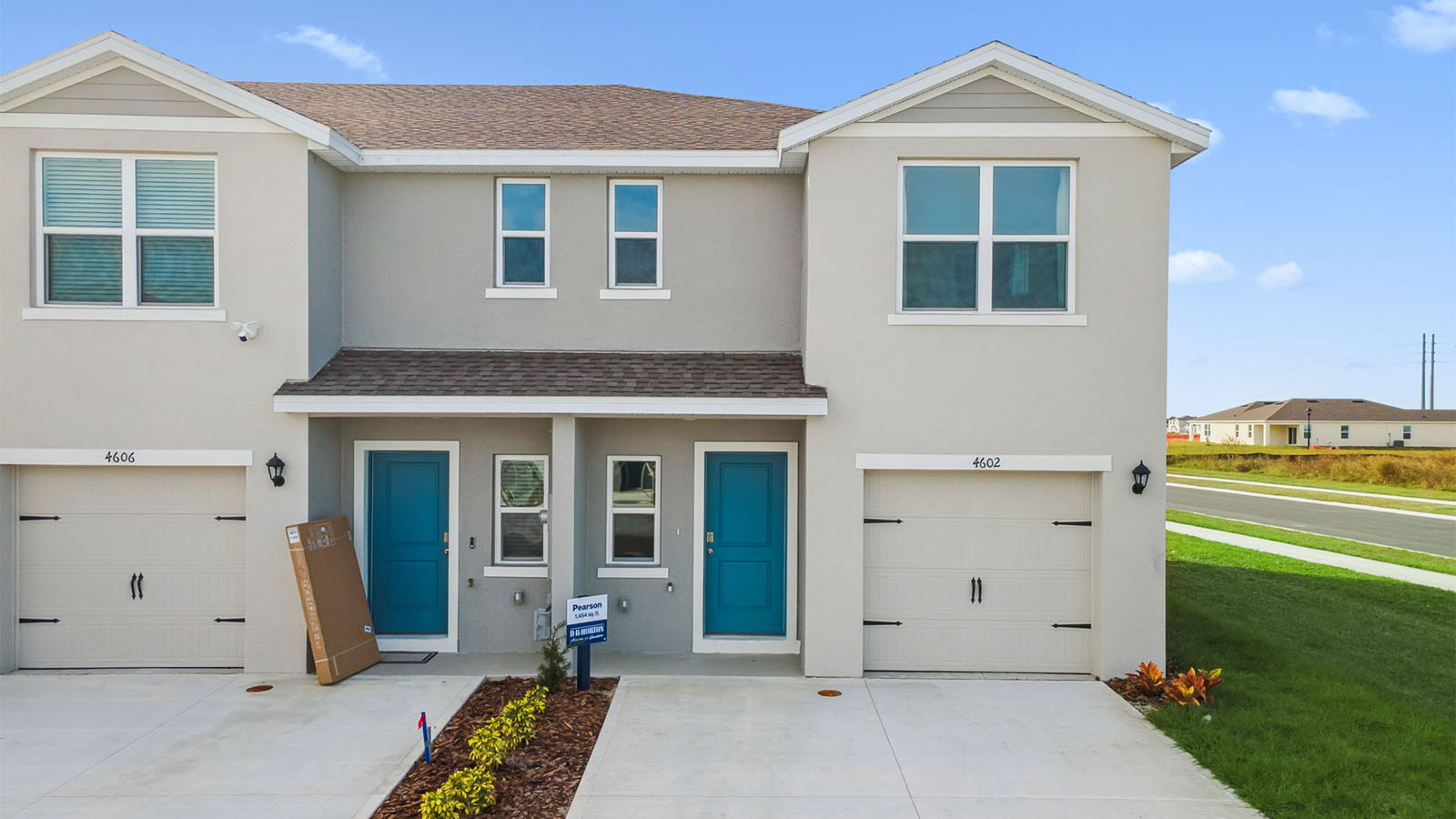 Two-story townhome with one-car garage