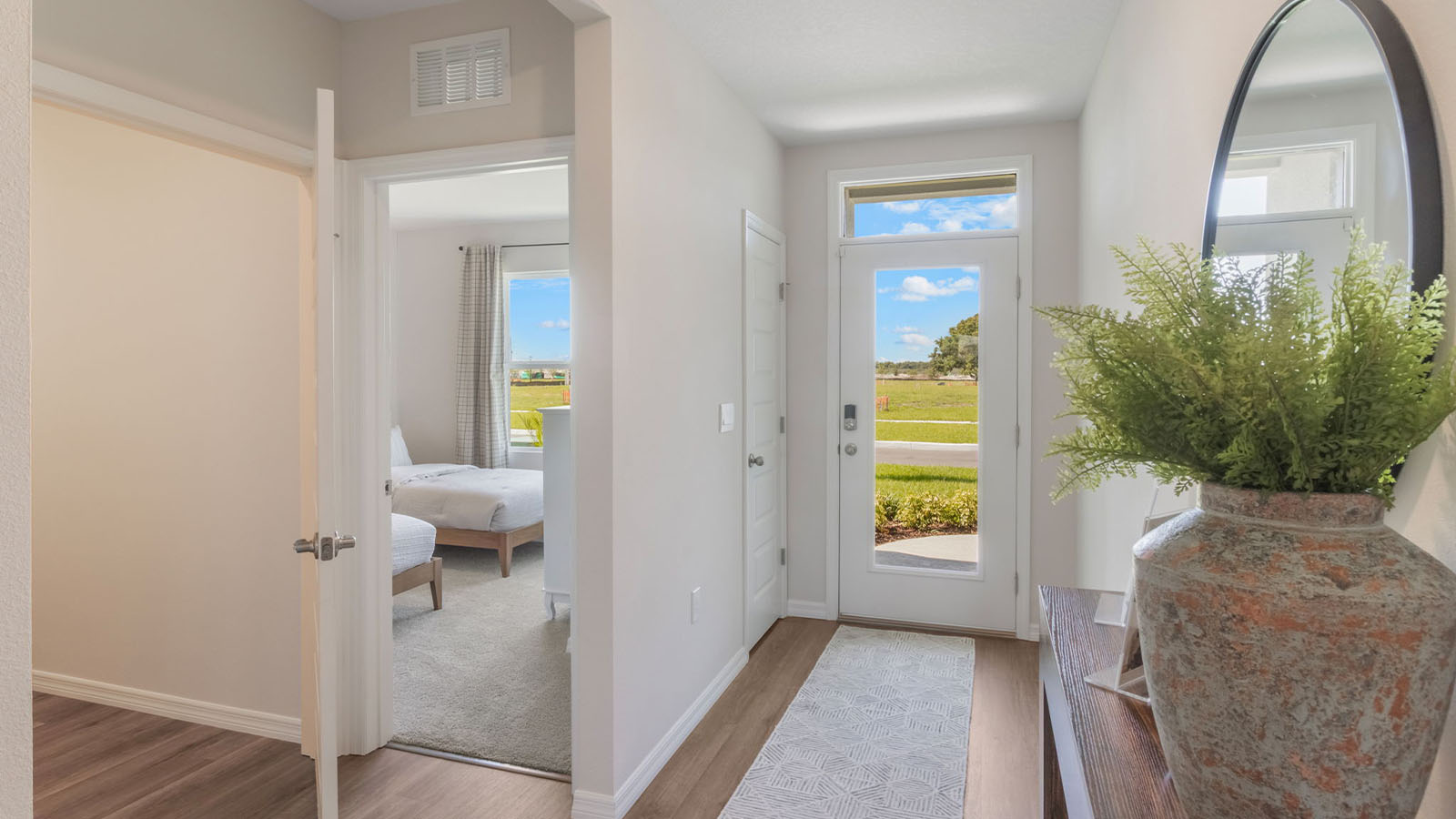 entry way of the home with luxury vinyl planks throughout