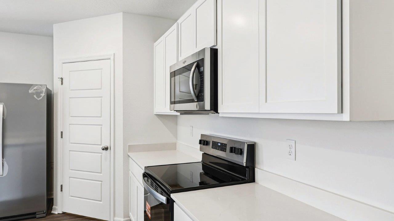 Kitchen with stainless steel appliances