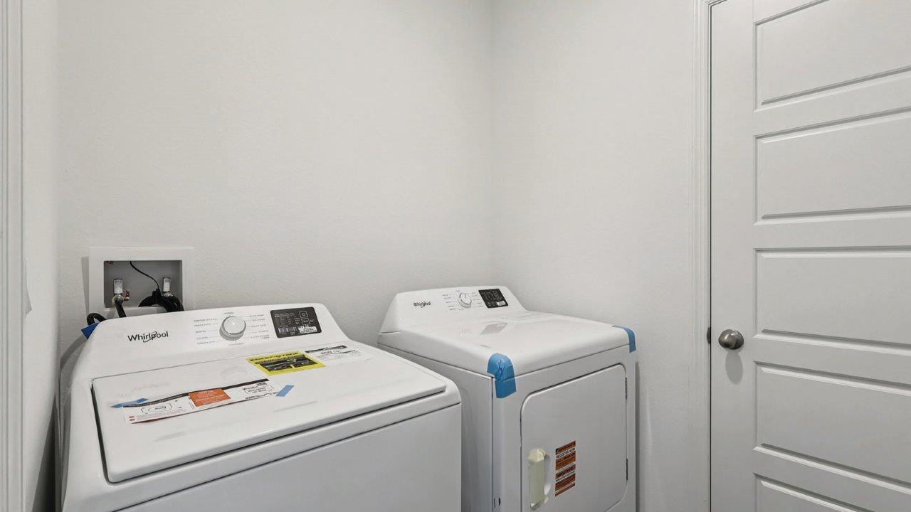 Laundry room with washer and dryer