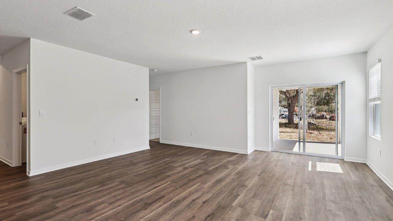 Living room with view of patio
