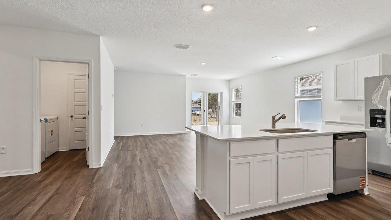 Kitchen showing open concept layout