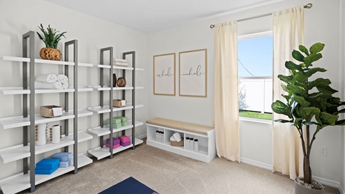 Guest bedroom decorated as a yoga room