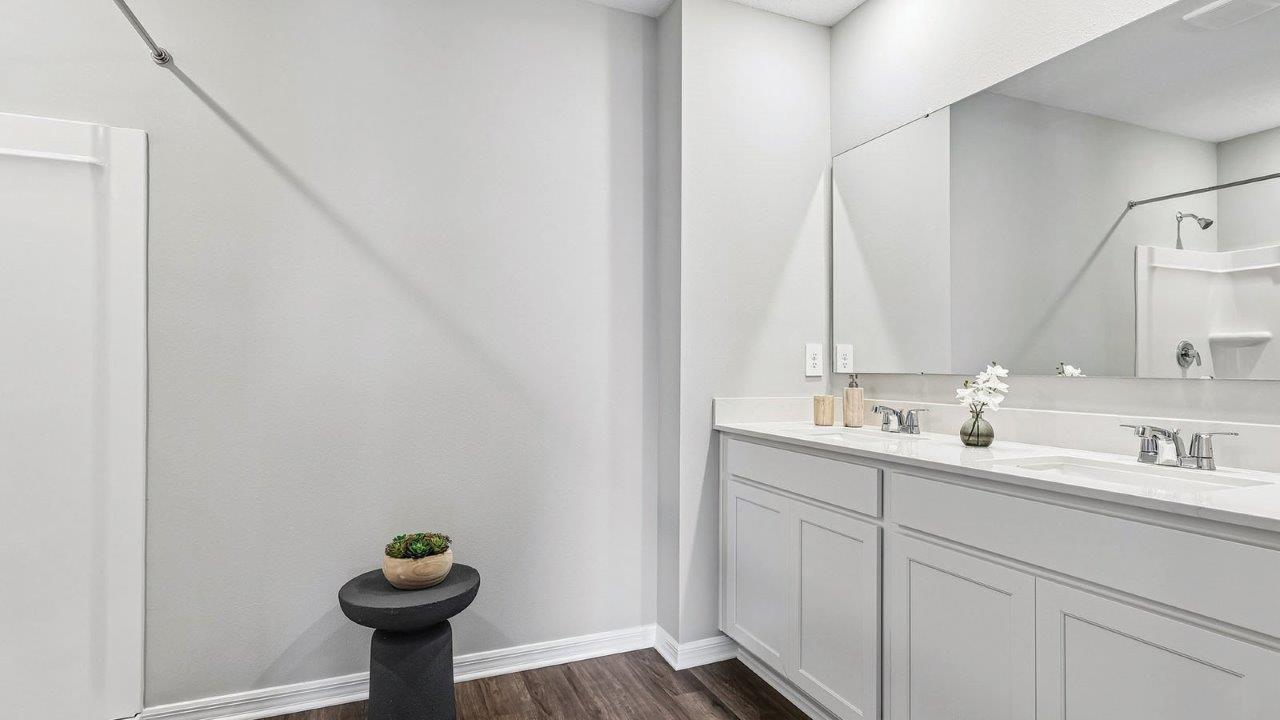 Primary bathroom with dual vanity sink
