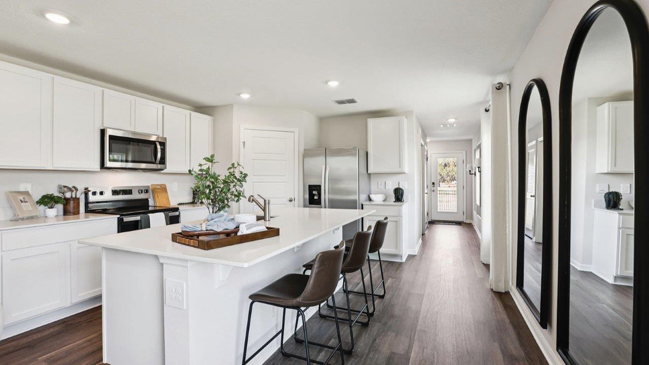 Kitchen with view of front entry
